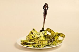 Dinner fork in measuring tape