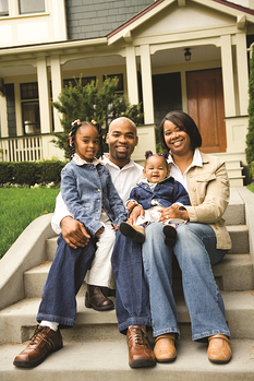 African american family sitting on step