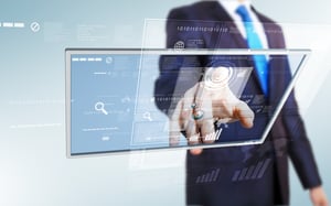 Businessman in blue suit working with digital vurtual screen