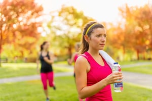 Healthy girl holding a water bottle