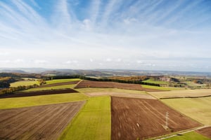 agricultural field representing future of electric farm tractors