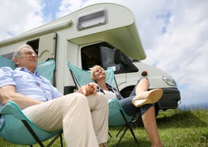 recreation vehicle with couple outside