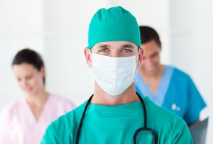 Portrait of a surgeon wearing a surgical mask in a hospital-1