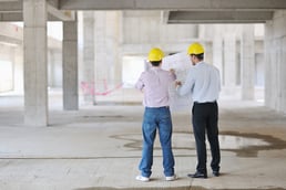 Team of business people in group, architect and engineer  on construction site check documents and business workflow on new building