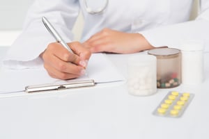 writing a prescription for pharmaceutical pill
