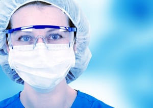 female surgeon in a hospital in blue tones